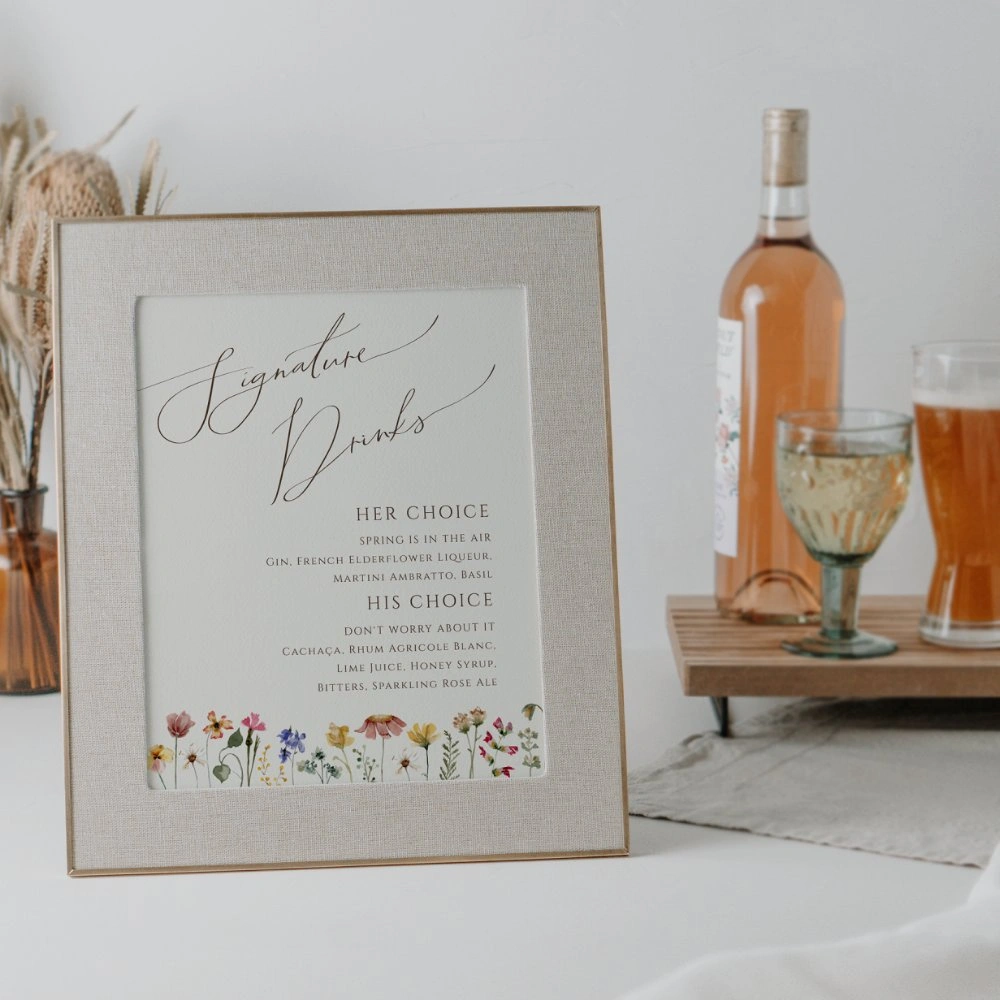 elegant handwritten wedding drinks sign with watercolor flowers