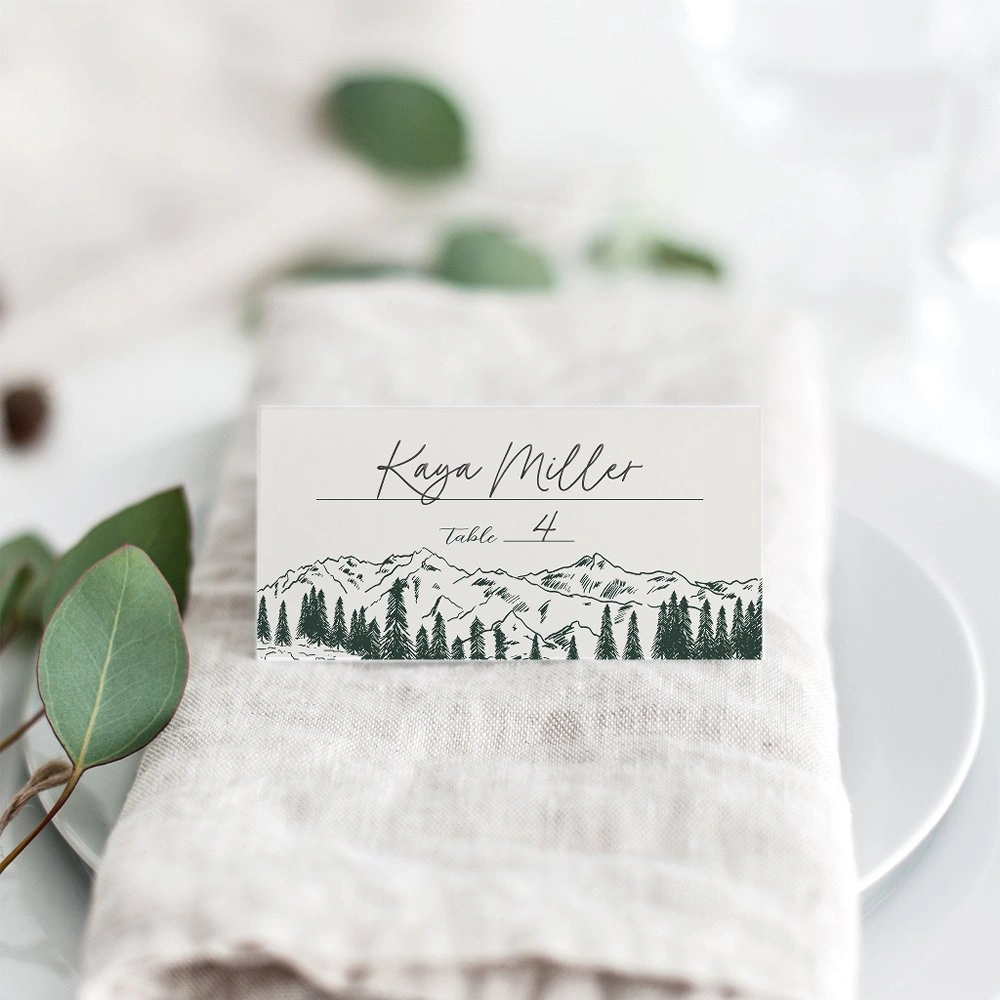 Hunter green mountain sketch wedding place card with rustic forest design